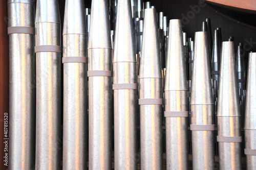 Church organ musical keys pipes.