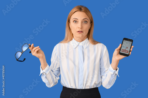 Stressed woman with mobile ...
