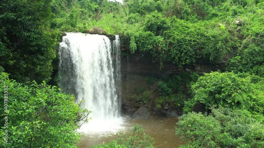 Aerial view of amazing waterfalls in nature in tropical forest, rainy season at public and famous place in Trat Province of Thailand. Aerial view of amazing waterfalls in nature in tropical forest, rainy season at public and famous place in Trat Province of Thailand.