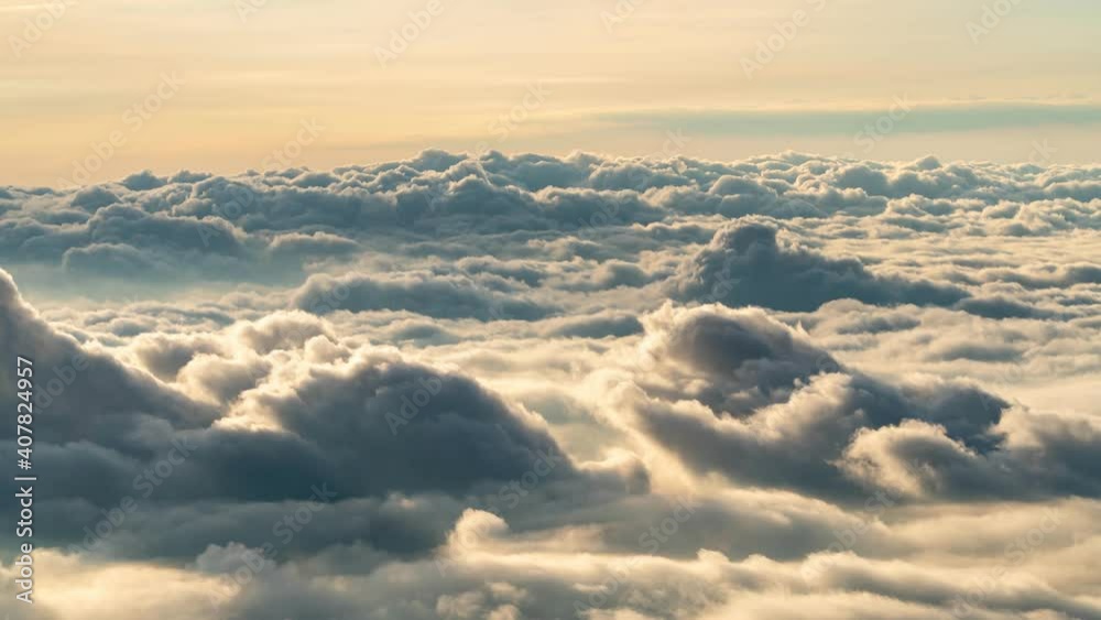 4K Time lapse clouds as the sky sunrise fog form misty nature ridge mountains Time passes slowly, fog and clouds are beautiful.
