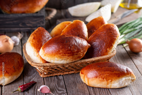 Piroshki - russian baked puff pastry with cabbage fillings.