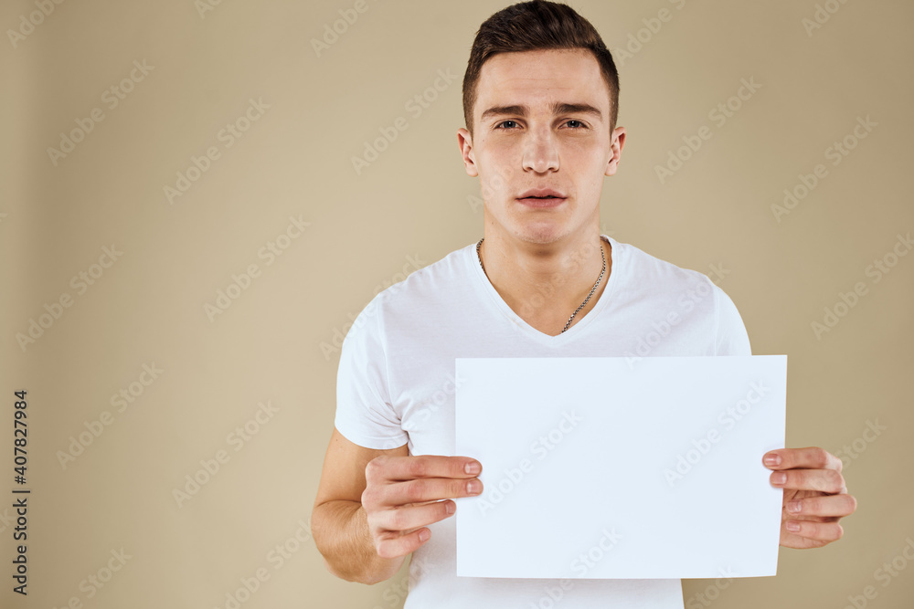 man holding white sheet of paper in hand billboard copy space office man holding white sheet of paper in hand billboard copy space office