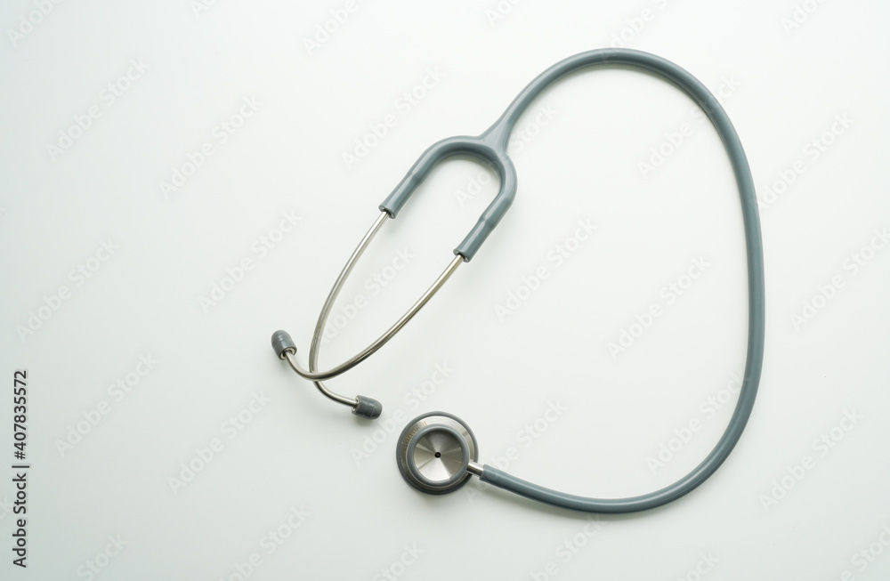 Stethoscope isolated on white, top view. Medical tool Stethoscope isolated on white, top view. Medical tool