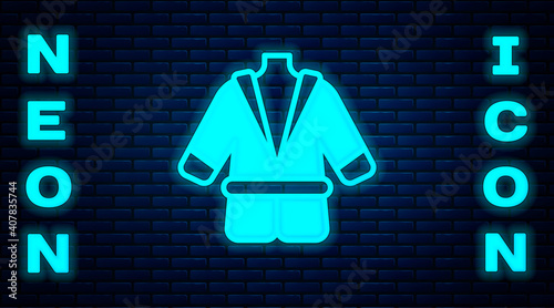 Glowing neon Bathrobe icon isolated on brick wall background. Vector.
