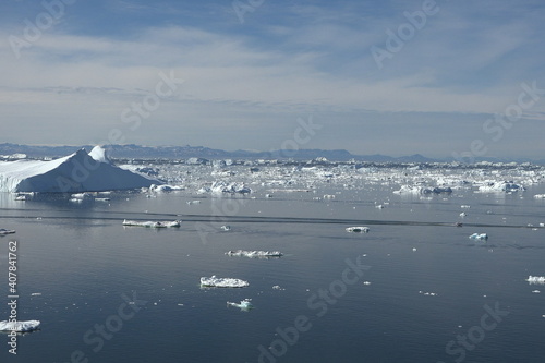 Greenland. Iceberg and ice from glacier in arctic nature. Icebergs in Ilulissat icefjord. Affected by climate change and global warming.