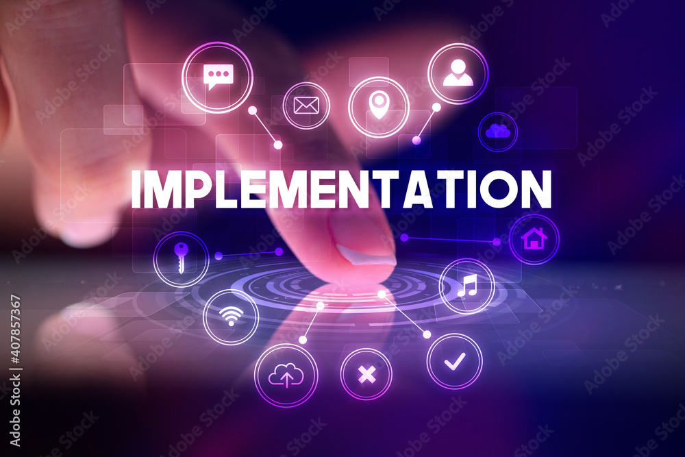 Finger touching tablet with web technology icons and IMPLEMENTATION inscription, web technology concept Finger touching tablet with web technology icons and IMPLEMENTATION inscription, web technology concept