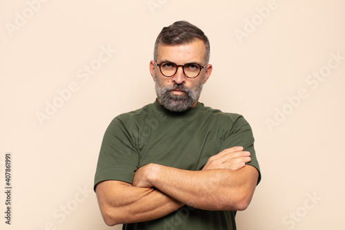 Cuadro en lienzo adult handsome man feeling displeased and disappointed, looking serious, annoyed