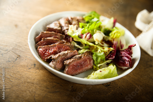 Mixed salad with grilled beef steak