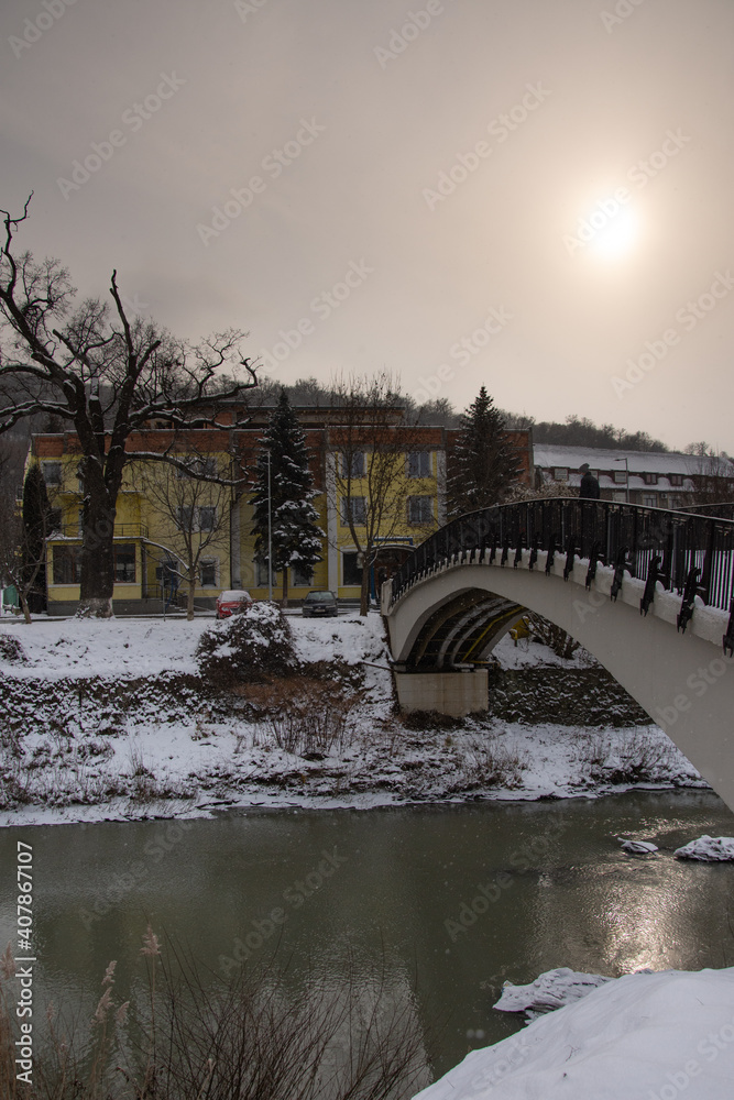 Romania, Bistrita ,Bistrita River and the bridge at Codrisor in January 2021