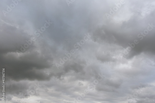 Stormy sky with fluffy clouds, abstract background