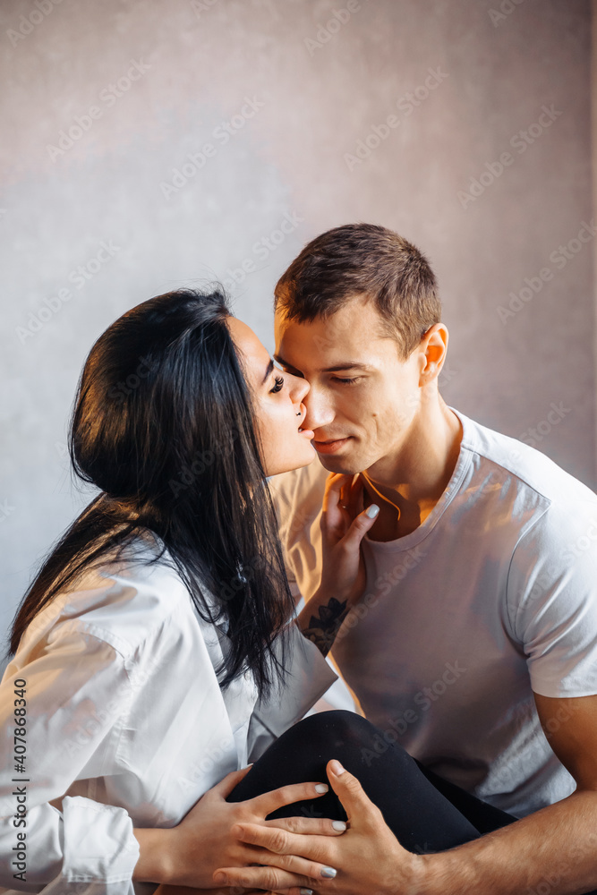 Young sexy brunette girl takes the initiative in sexual relationship with her boyfriend. Kisses him persistently, seducing him with her attractive body. Young romantic lovers intimate moments Young sexy brunette girl takes the initiative in sexual relationship with her boyfriend. Kisses him persistently, seducing him with her attractive body. Young romantic lovers intimate moments