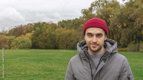 Wallpaper Mural Man standing in a Park in autumn, a man with a thoughtful expression on the background of an autumn Park, portrait, 16: 9 Torontodigital.ca