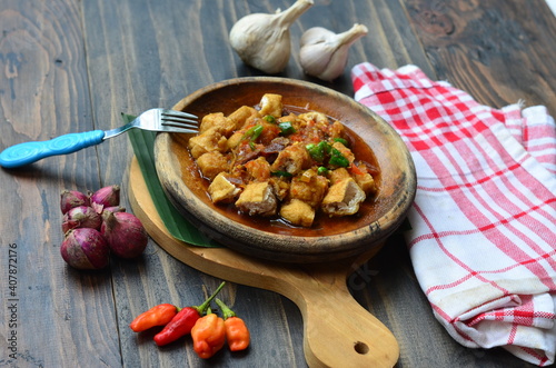 tahu gejrot or gejrot tofu, traditional food from west java indonesia photo