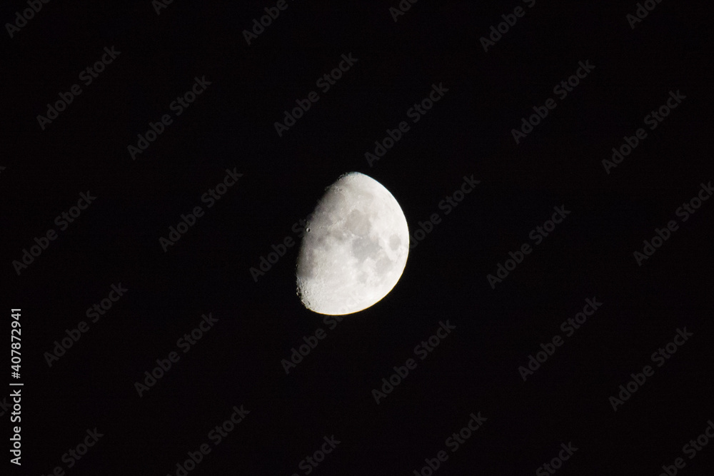 Large moon in the dark night sky. Large moon in the dark night sky.