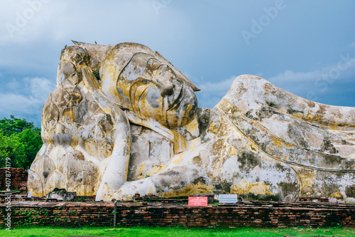 Closeup shot of the Reclining Buddha, Wat Lokaya Sutha, Ayutthaya photo