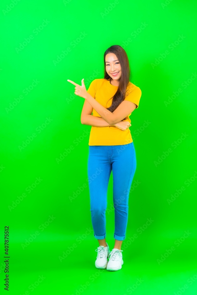 Portrait beautiful young asian woman smile with action Portrait beautiful young asian woman smile with action