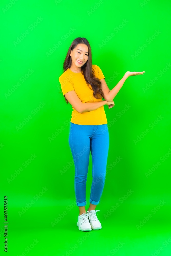 Portrait beautiful young asian woman smile with action Portrait beautiful young asian woman smile with action