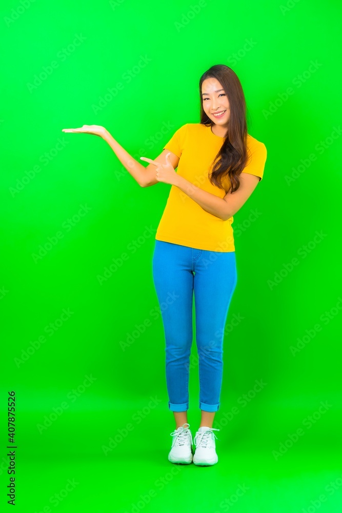 Portrait beautiful young asian woman smile with action Portrait beautiful young asian woman smile with action