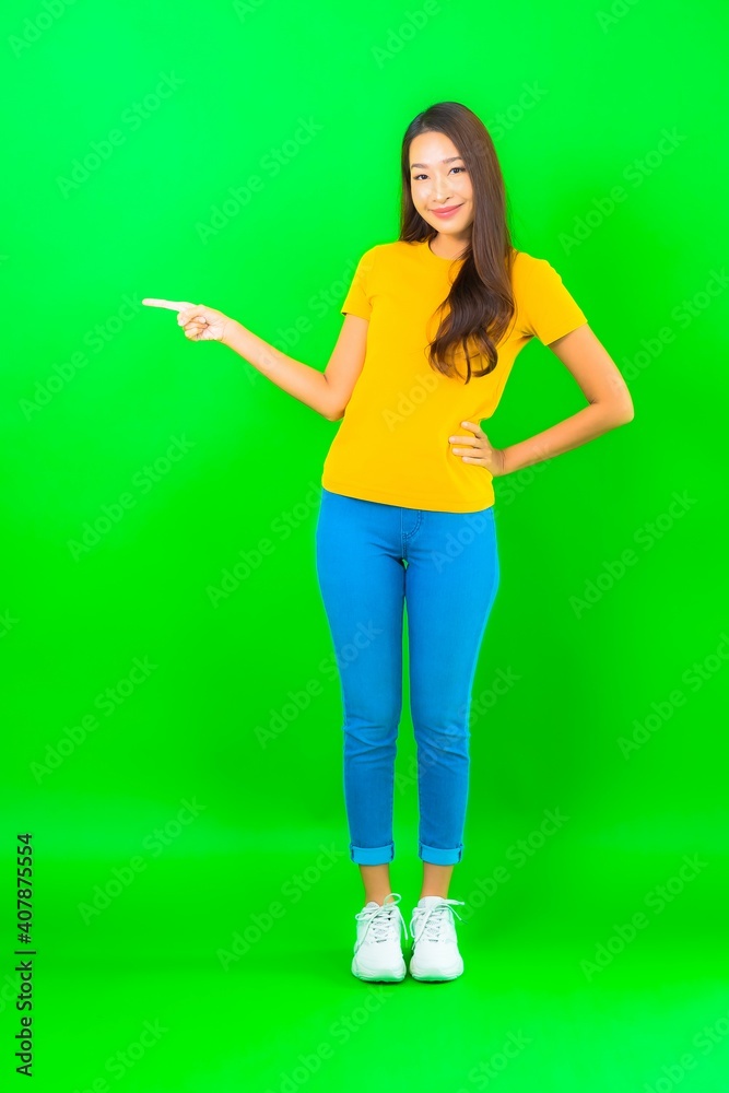 Portrait beautiful young asian woman smile with action Portrait beautiful young asian woman smile with action