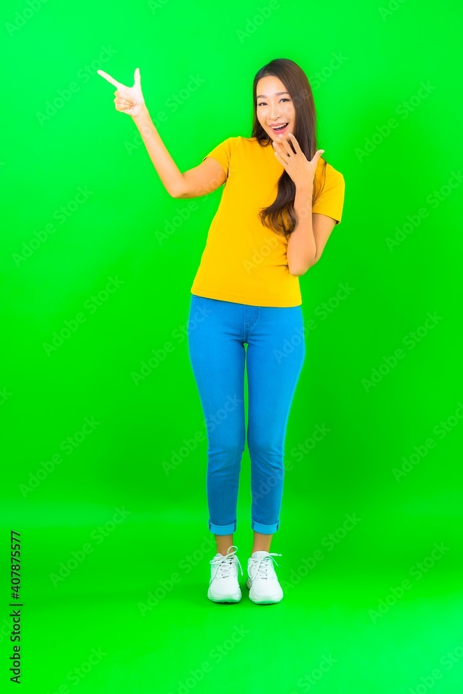 Portrait beautiful young asian woman smile with action Portrait beautiful young asian woman smile with action