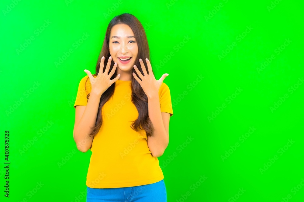 Fototapeta premium Portrait beautiful young asian woman smile with action