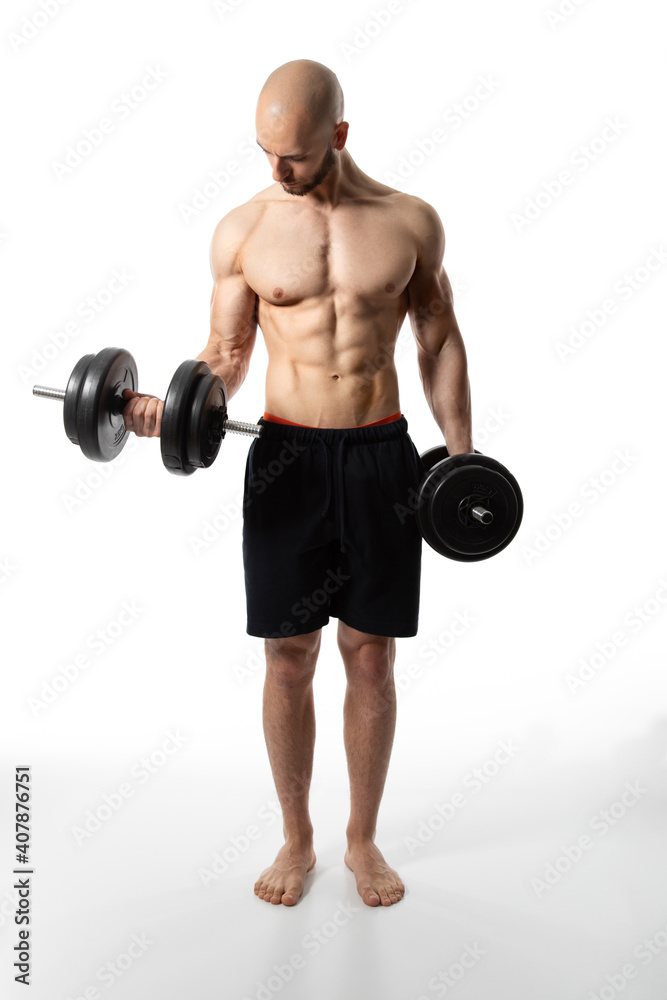 lifting weights with strong arm by a shirtless young shirtless testosterone guy with bald head lifting weights with strong arm by a shirtless young shirtless testosterone guy with bald head