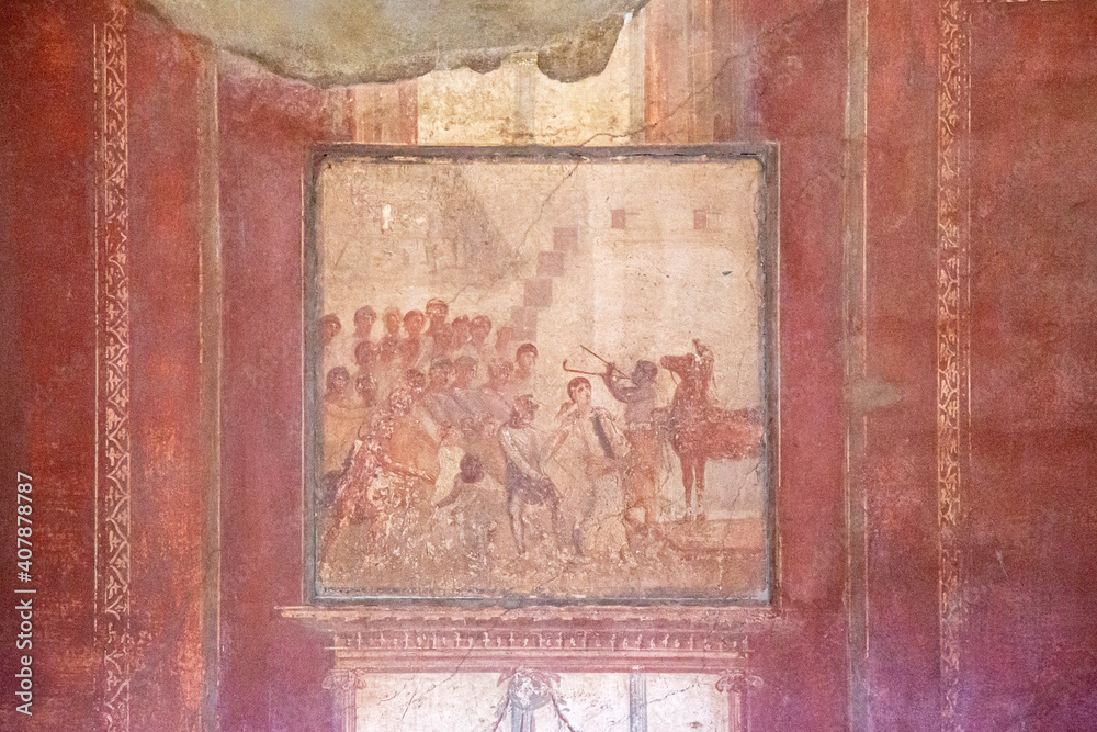 An ancient fresco preserved on the wall of the ruins of a house in the ancient city of Pompeii, which was lost due to the eruption of Mount Vesuvius.