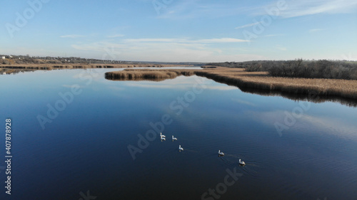 Vászonkép The estuary of a river with blue water
