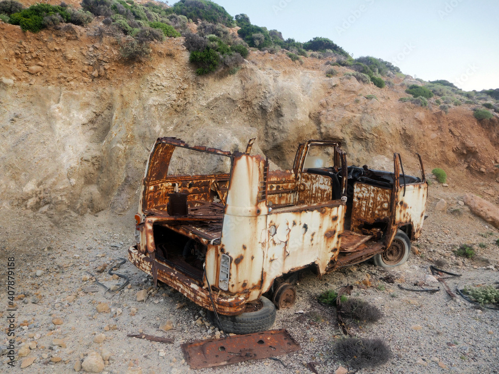 Rusty old minibus/van abandoned broken on a Greek island
