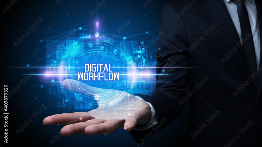 Man hand holding DIGITAL WORKFLOW inscription, technology concept Man hand holding DIGITAL WORKFLOW inscription, technology concept