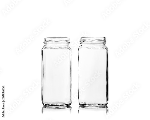 Two empty glass jars isolated on white background