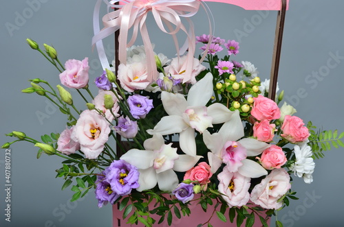 fresh flowers in paper boxes photo