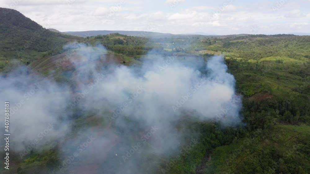 Fire in the rainforest. Farmers burn forest for new farmland. Mindanao, Philippines. Fire in the rainforest. Farmers burn forest for new farmland. Mindanao, Philippines.