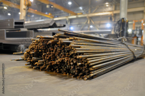 Warehousing in the shop of the plant stock of a metal bar.