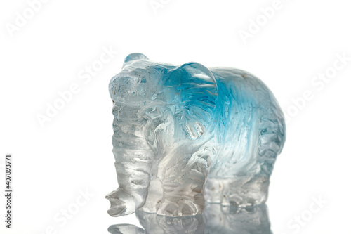 beautiful statuette elephant from the mineral topaz on a white background