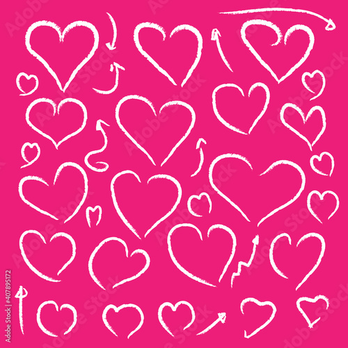 Heart shaped white chalk lines on pink background