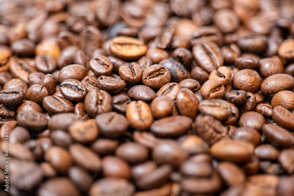 coffee beans close-up, foreground and background blurred, focus on middle coffee beans close-up, foreground and background blurred, focus on middle