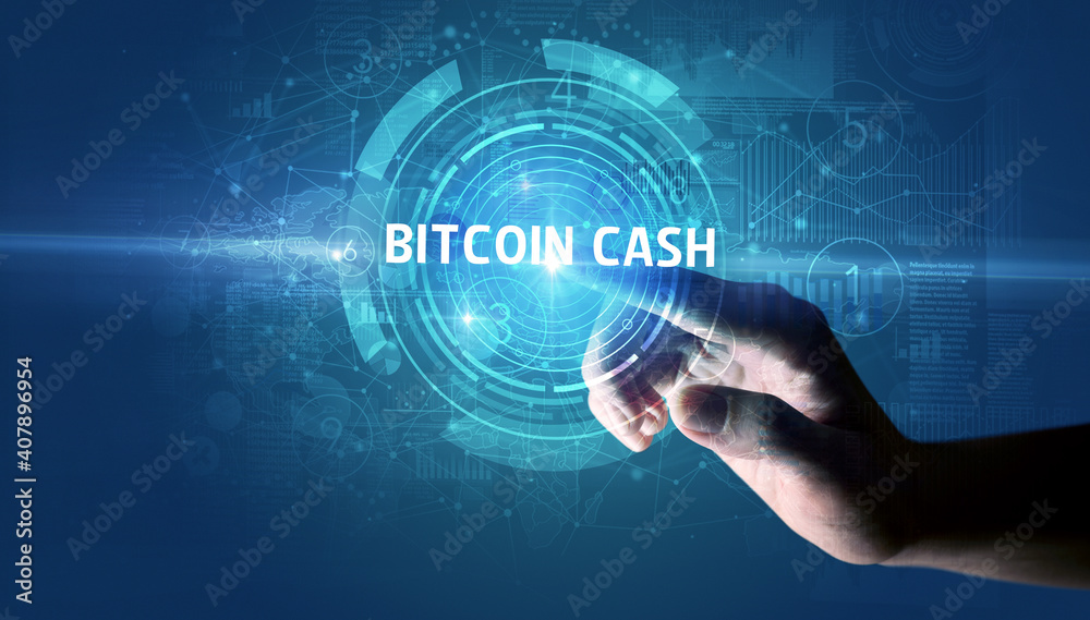 Hand touching BITCOIN CASH button, modern business technology concept Hand touching BITCOIN CASH button, modern business technology concept