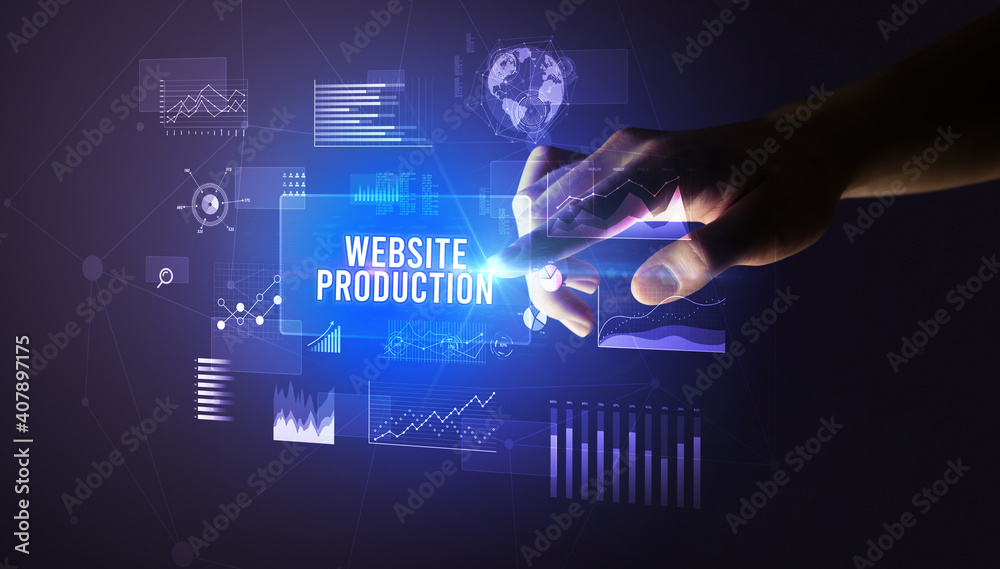 Hand touching WEBSITE PRODUCTION inscription, new business technology concept Hand touching WEBSITE PRODUCTION inscription, new business technology concept