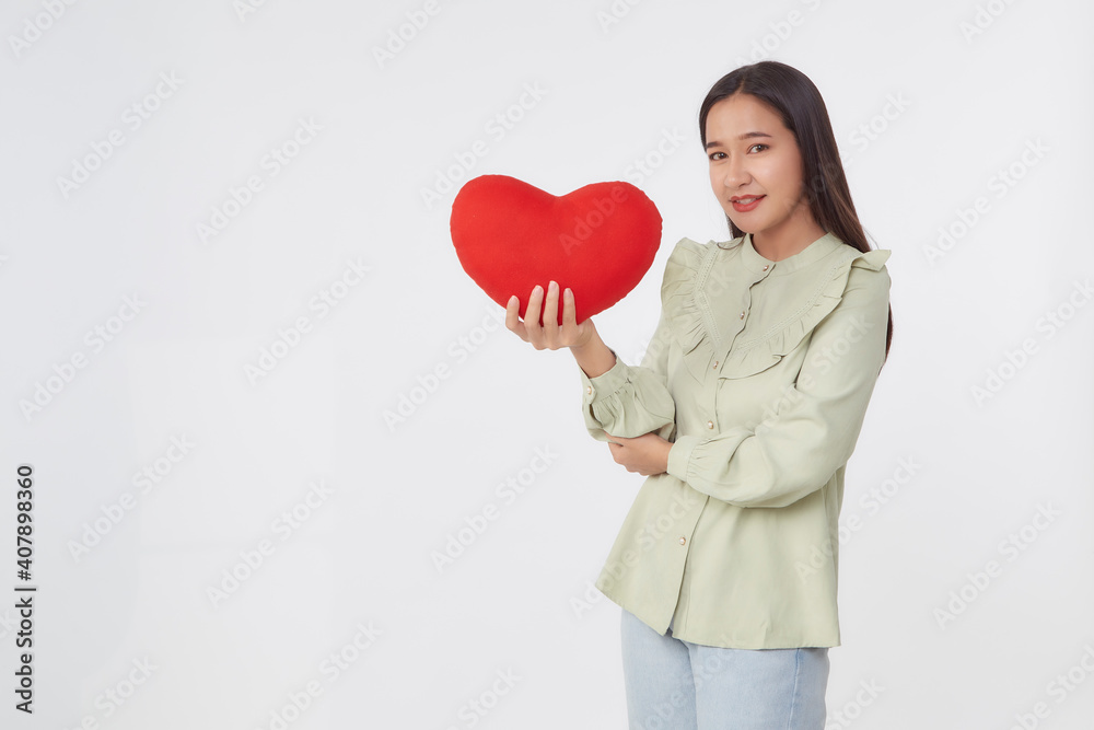 young attractive woman holding a red heart young attractive woman holding a red heart