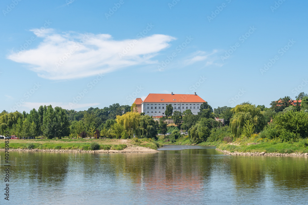 Historical King City on the bank of the Vistula river with the castle - panoramic view from riverboat cruise, Sandomierz, Poland