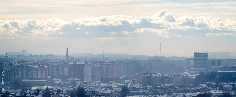 Fototapeta premium Ivano-Frankivsk city in haze on a winter day