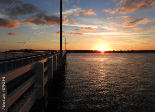 Closeup shot of the Bribie island bridge under the sunset sky photo