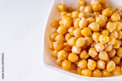 boiled chickpeas on a white acrylic background