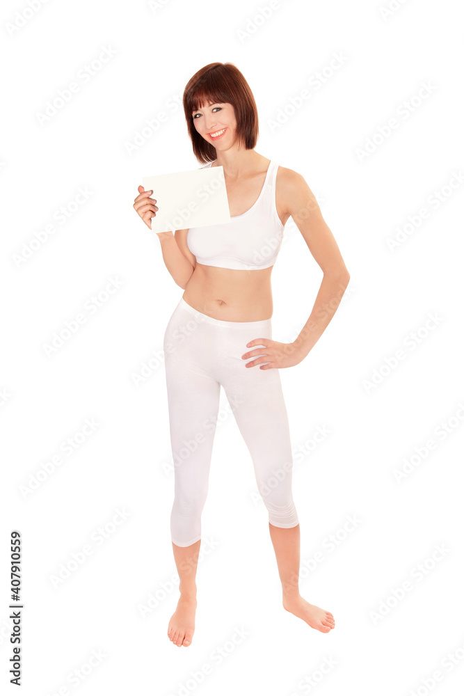 Full length portrait of an athletic young woman holding a blank placard, isolated on white studio background Full length portrait of an athletic young woman holding a blank placard, isolated on white studio background