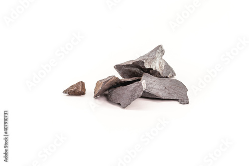 hematite, raw ore. a frequently occurring iron oxide in soils and rocks used in industry