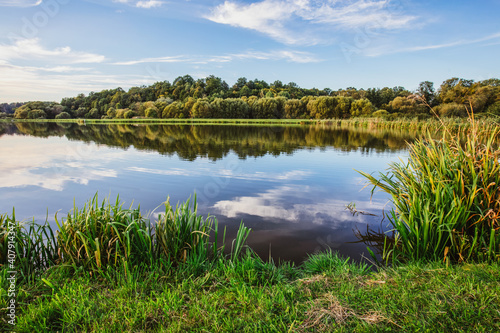 Fototapeta Naklejka Na Ścianę i Meble -  Lake at sunset. Countryside rural scenery in Poland