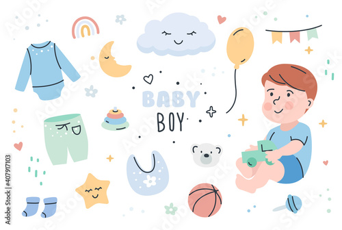 Baby boy with toys and clothes set.