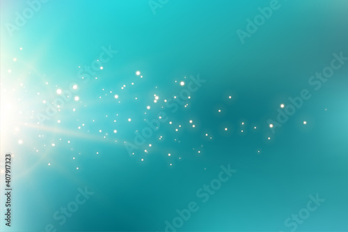 turquoise background with sparkling light flare effect