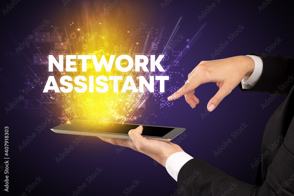 Close-up of a touchscreen with NETWORK ASSISTANT inscription, innovative technology concept
